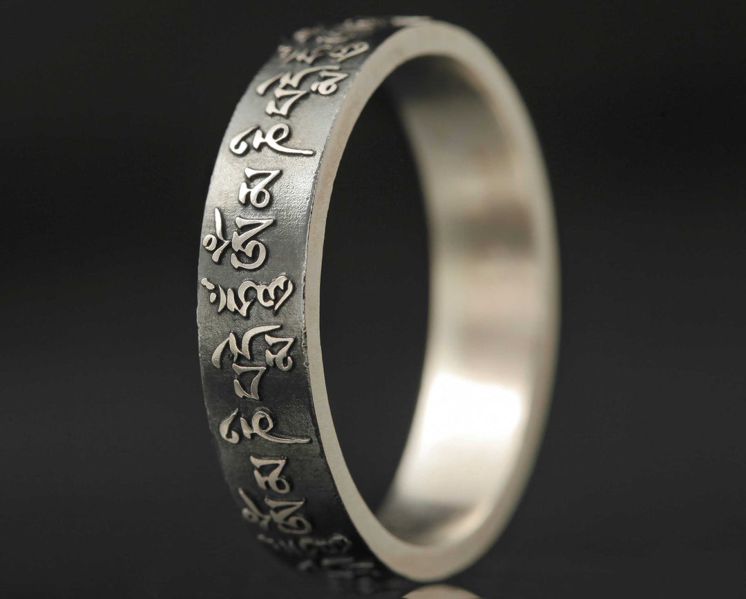 2/3  in silver Tibetan mantra white