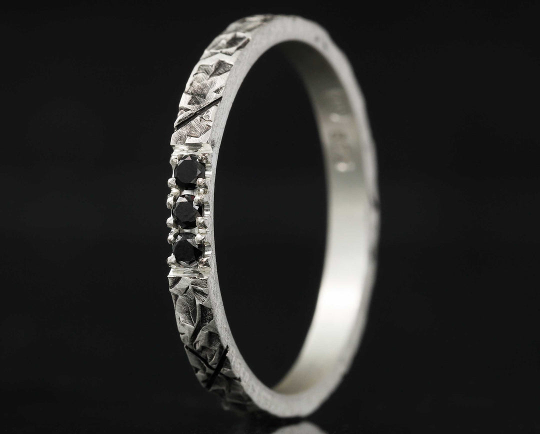 Medium addon in silver rock set with black diamonds