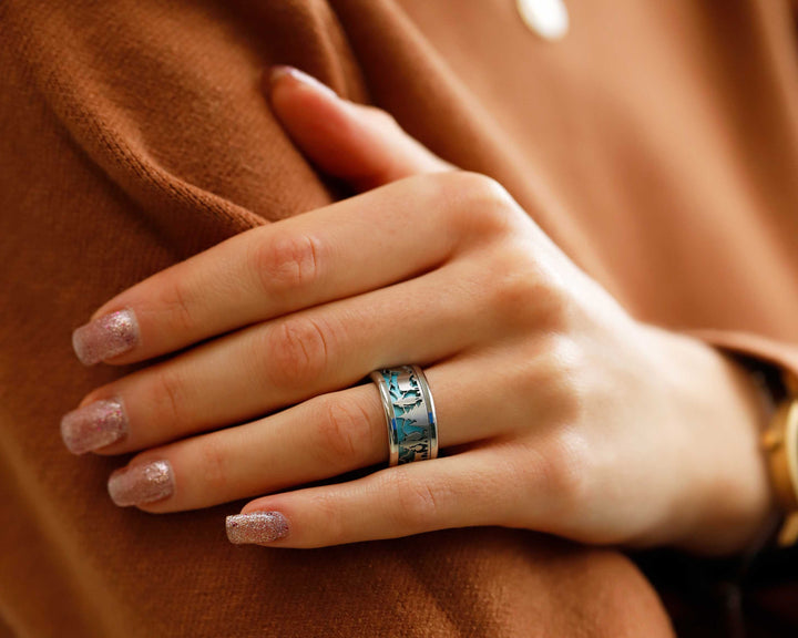 bague mood en acier inoxydable interchangeable suisse poya avec couleur turquoise et motifs suisses d'alpage et vache